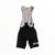 Men's cycling bib shorts, black legs with light gray straps and Rapha logo.