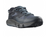The Salomon Mens Predict Hike GTX Shoe is a dark gray hiking shoe with blue-gray laces, a thick textured sole, and rugged tread, shown from the front left side.