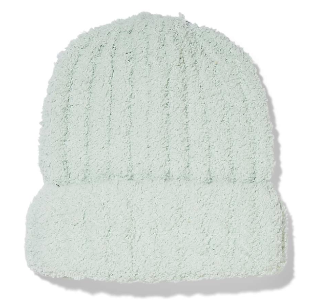 The Spyder Women's Cloud Knit Hat, shown on a white background, features a light mint green ribbed design with a thick folded brim and is made from soft recycled polyester for cozy comfort—perfect for casual style.