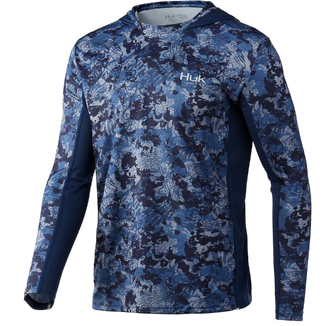 The Huk Mens Icon X Tide Change Hoodie is a long-sleeve, moisture-wicking hoodie with a blue, navy, and gray camo design and the Huk logo on the left chest—ideal as your everyday outdoor layer.