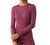A woman stands with arms crossed at the wrist, wearing a fitted maroon Smartwool Women's Intraknit Thermal Merino Base Layer Crew and matching leggings against a plain background.