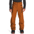 A person wears The North Face Mens Sickline Pant in burnt orange with black zippers, a dark long-sleeve shirt, and black boots. The waterproof ski pants have a loose fit and multiple zippered pockets, shown against a white background.