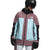 A person in a helmet, ski goggles, gloves, and The North Face Men’s Balfron Jacket in mauve, light blue, and black color blocks with a breathable shell stands against a white background.