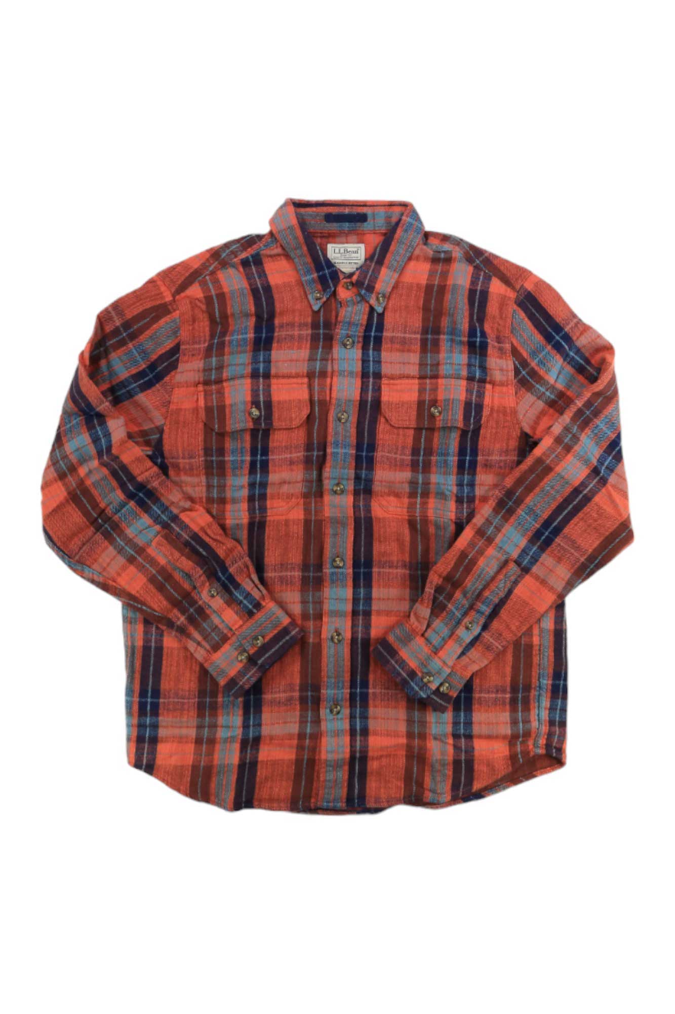 The L.L.Bean Mens 1912 Field Flannel Slightly Fitted Plaid Shirt is a long-sleeved, button-up shirt with red, blue, and orange plaid and features two chest pockets with button flaps.