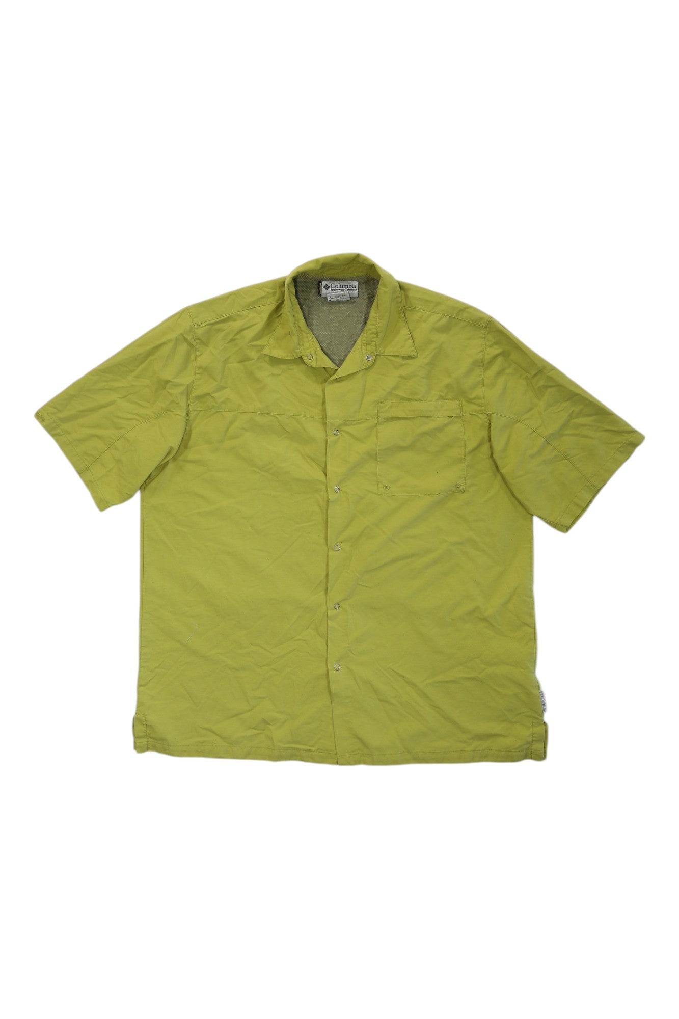 The Columbia Mens Short Sleeve Button Up Shirt, in light green, is displayed flat on a white background. It features a collar and left chest pocket, making it an ideal outdoor performance shirt with versatile style.