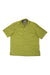The Columbia Mens Short Sleeve Button Up Shirt, in light green, is displayed flat on a white background. It features a collar and left chest pocket, making it an ideal outdoor performance shirt with versatile style.