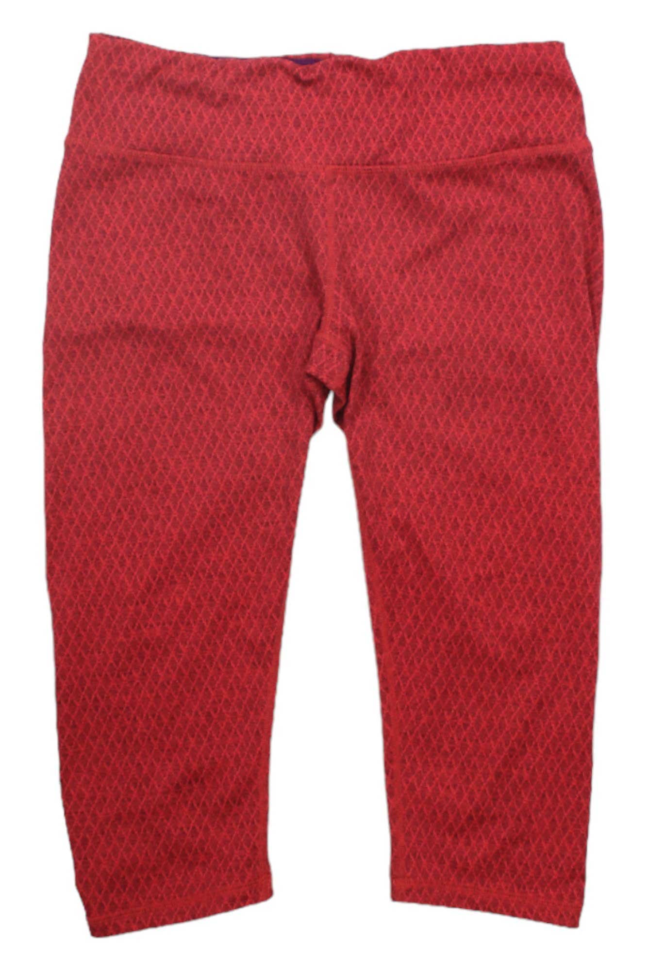A pair of red capri-length leggings featuring a subtle diamond pattern, shown flat on a white background—ideal as moisture-wicking activewear or women’s hiking leggings like the Prana Womens Misty Knickers.