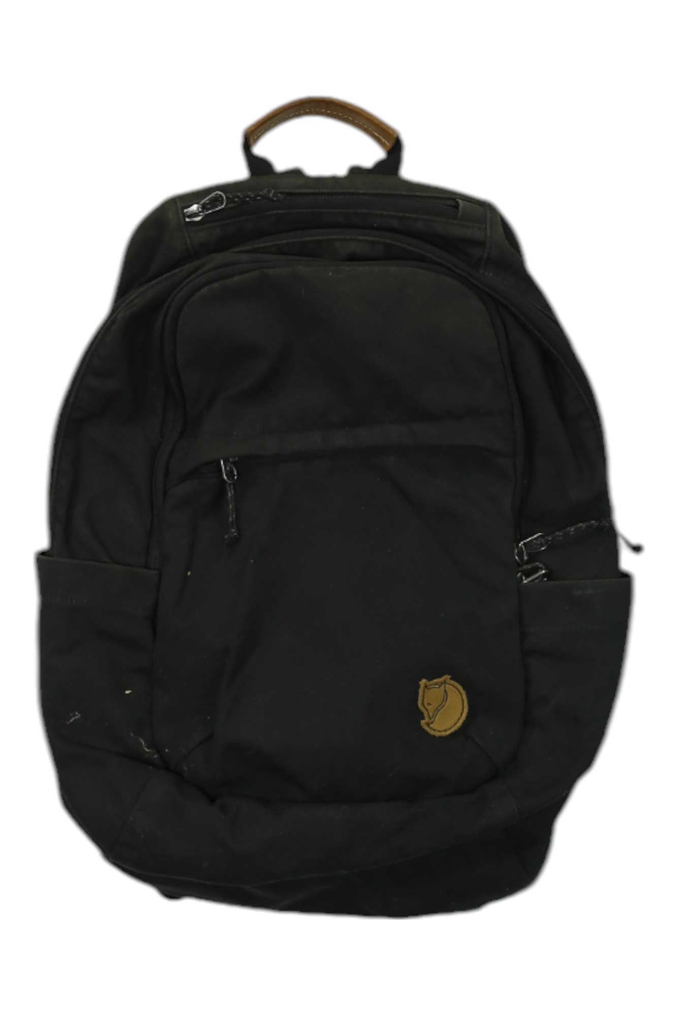 The Fjallraven Raven 20L Backpack in black features durable G-1000 HeavyDuty fabric, a front zip pocket, side pockets, a brown leather handle, and a small brown fox logo patch on the lower right corner. The background is white.