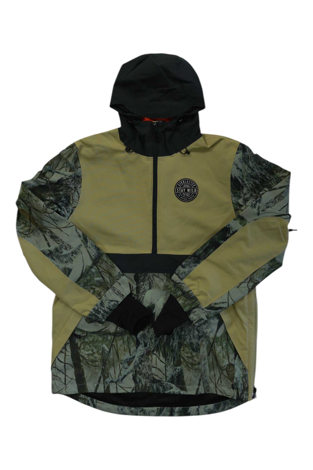 The Airblaster Mens Trenchover Jacket features a black hood, beige front, camo sleeves, and a circular STAY WILD chest logo—a waterproof shell ideal for any outdoor adventure.