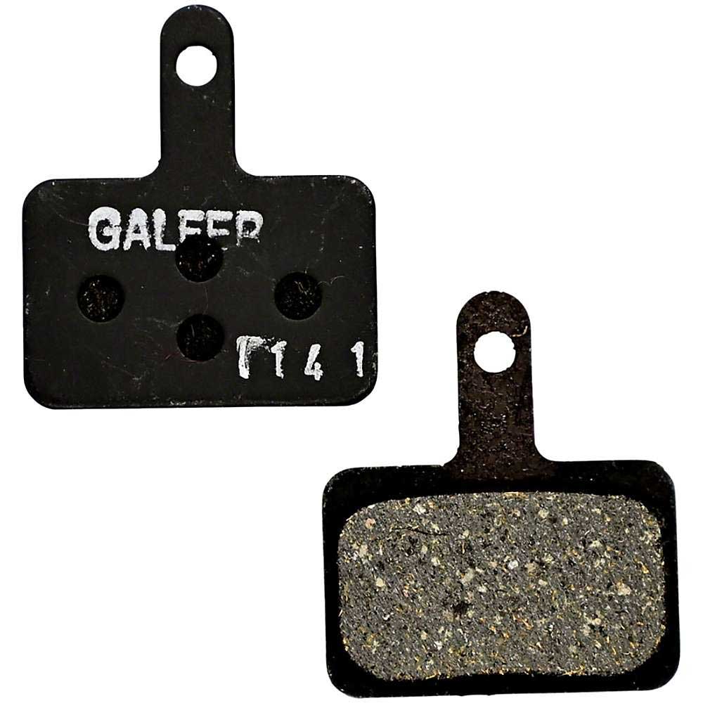 Disc brake pads with textured friction surface and mounting plate, black