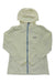 The Cotopaxi Womens Viento Travel Jacket is a light yellow, hooded jacket with a front zipper, long sleeves, side pockets, and a small logo patch on the left chest—ideal for travel and daily wear.
