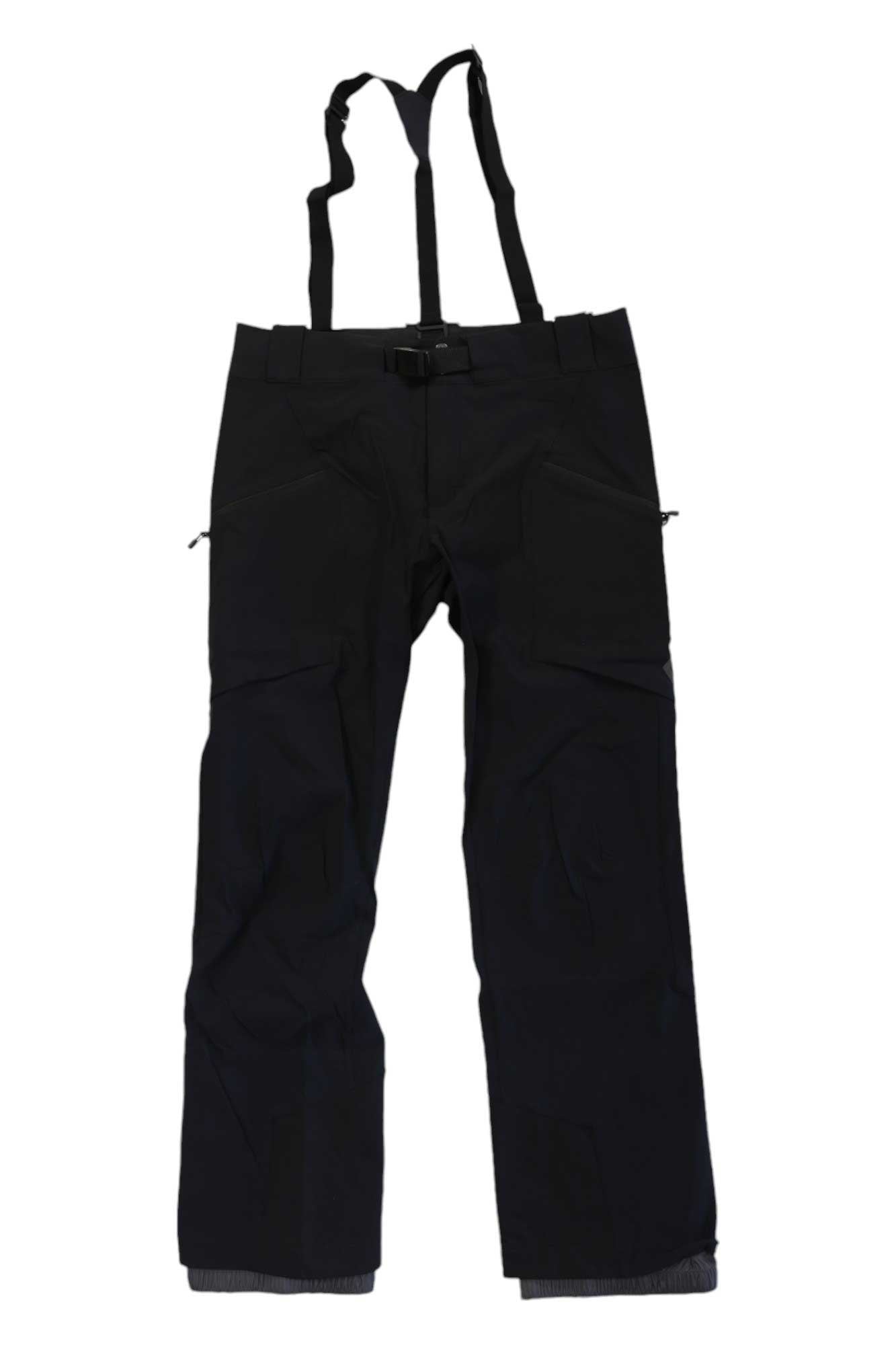 The Black Diamond Women's Dawn Patrol Pant features adjustable suspenders, four-way stretch fabric, a front zipper, belt loops, and zippered side pockets—ideal for hiking—displayed flat on a white background.