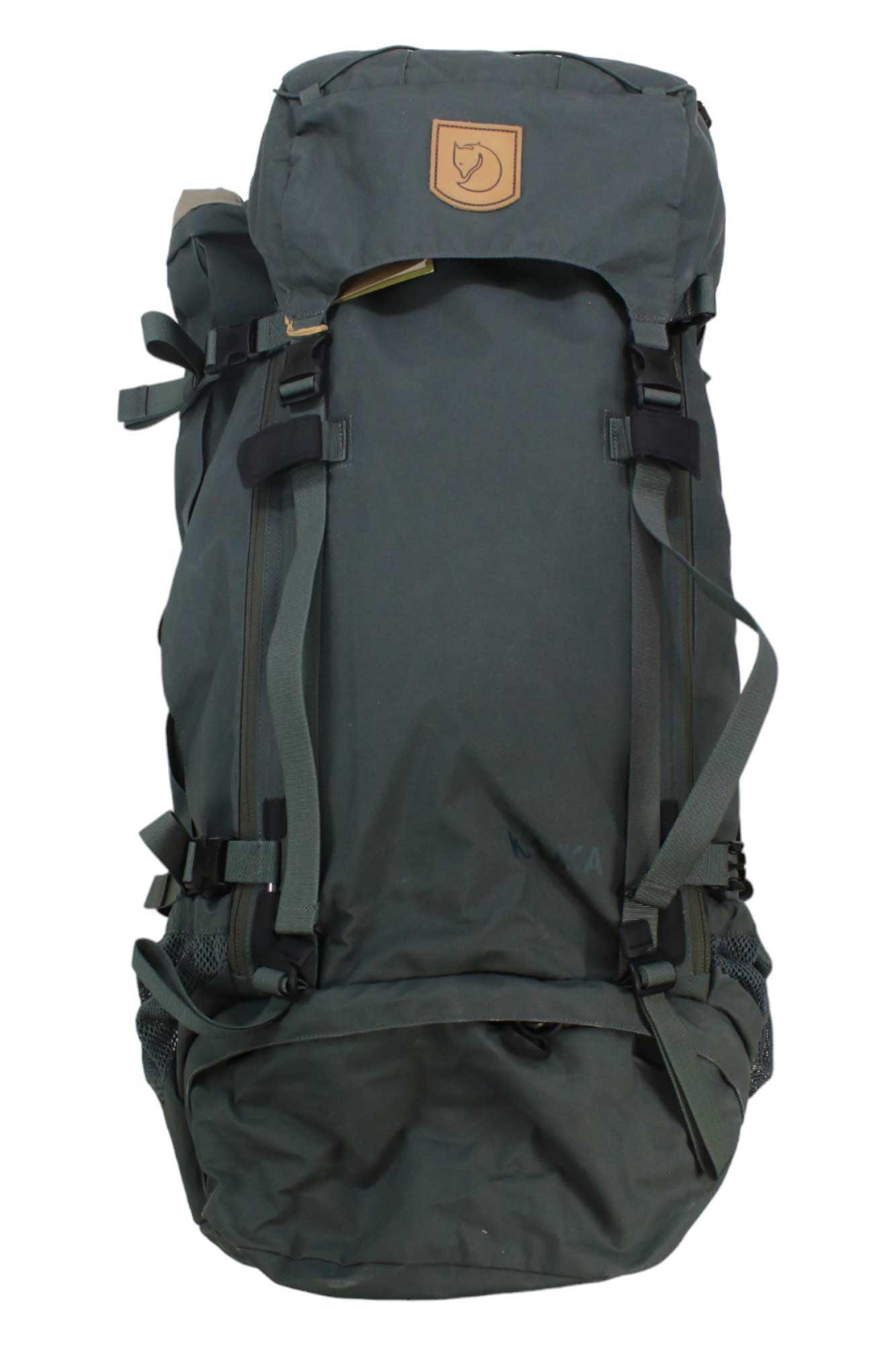 Hiking backpack with Fjallraven logo patch, front compression straps, dark blue-gray.