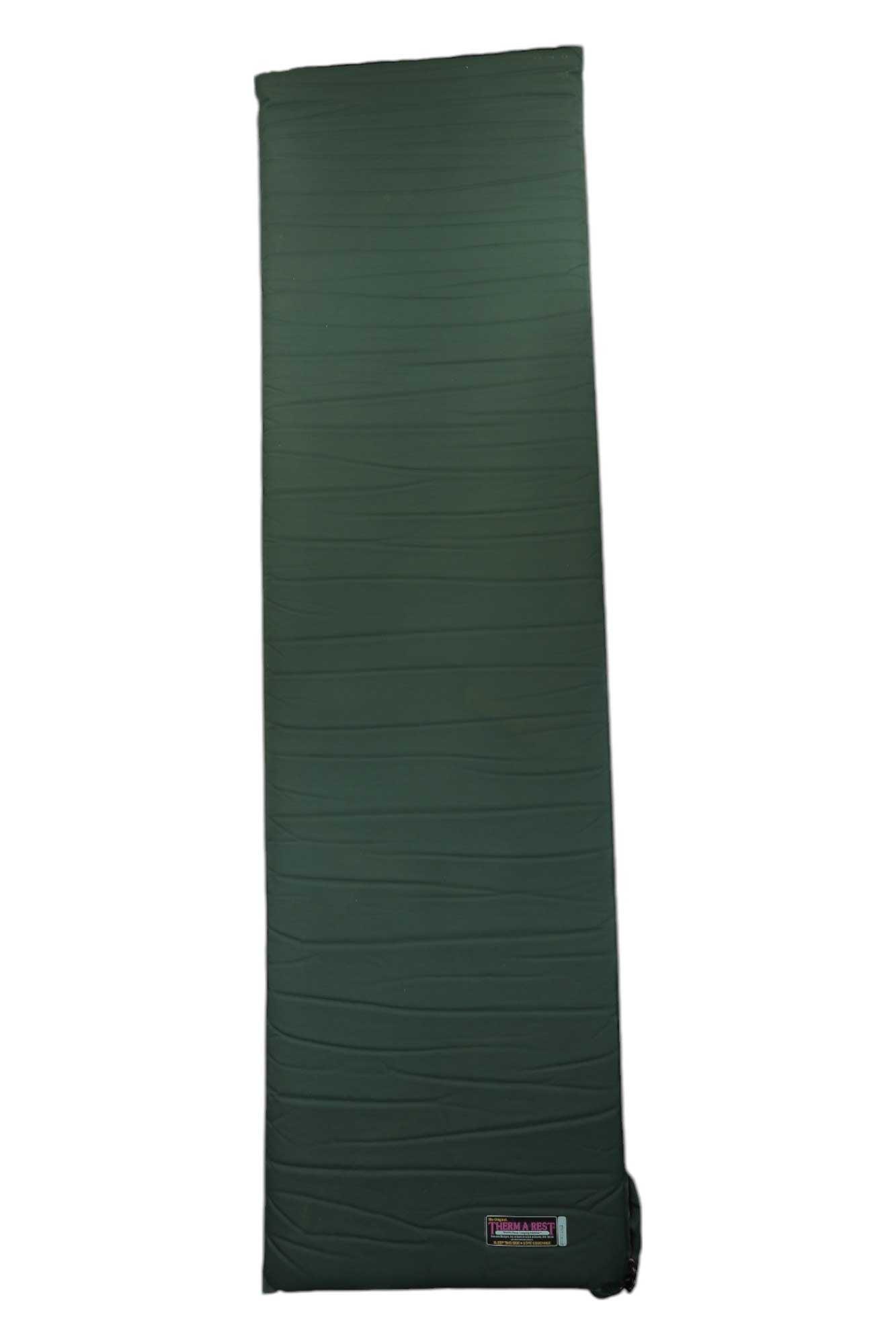 Green sleeping pad with stitched baffles and small Therm-A-Rest logo patch at bottom