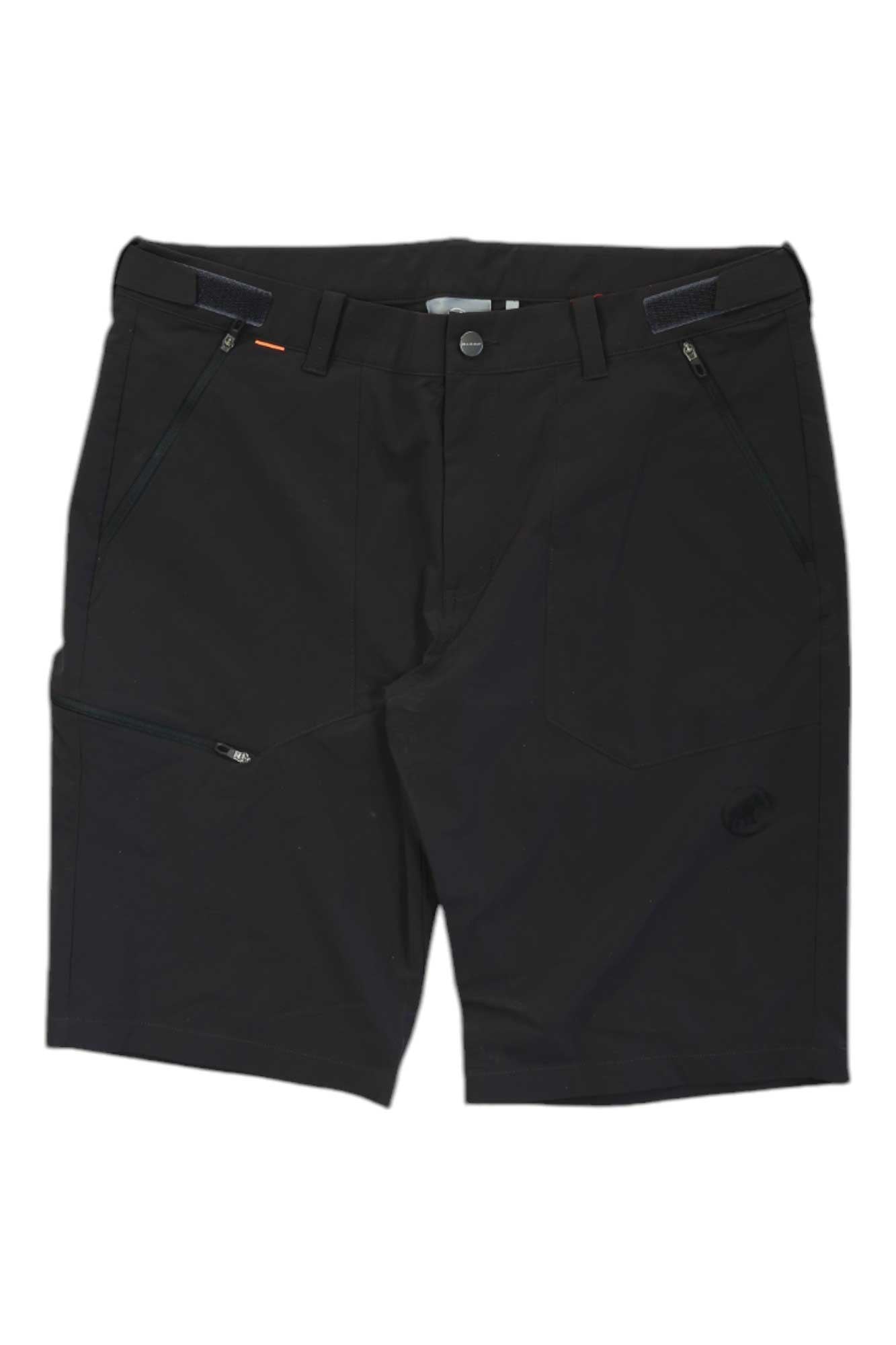 Mammut Mens Runbold Short: Quick-drying black hiking shorts with front zip pockets, belt loops, and a button closure. Sleek design ideal for outdoor hikes or casual wear. Shown laid flat on a white background.