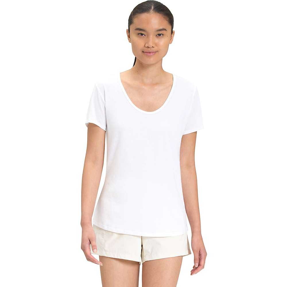 Women’s white scoop-neck short-sleeve T-shirt on model, relaxed fit.