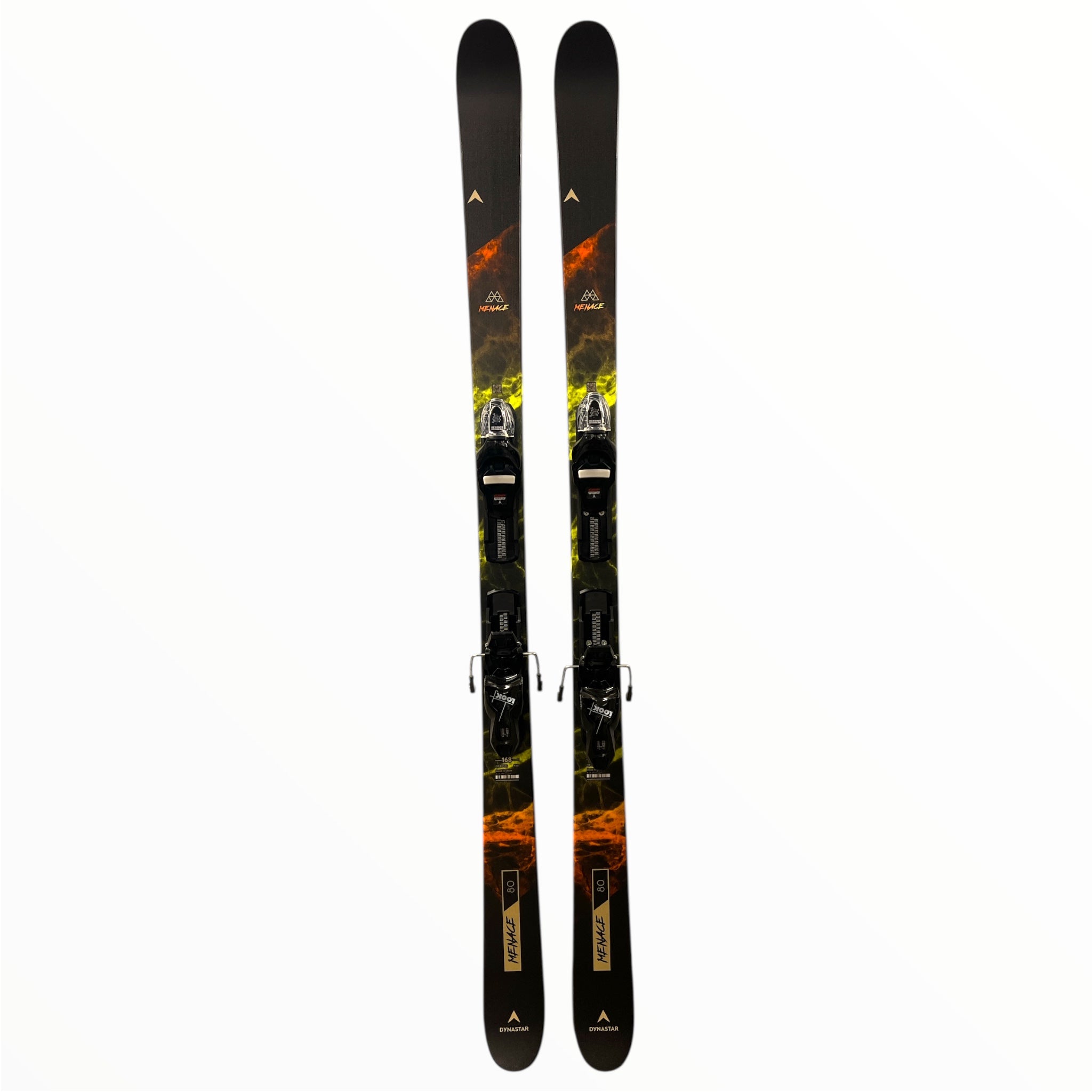 The Dynastar M-Menace 80 + XPress 10 GW Bindings skis, featuring black with yellow and orange abstract patterns, are shown upright against a white background.