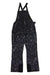 The Obermeyer Womens Malta Overalls Bib, in black and gray camo, features waterproof fabric, adjustable shoulder straps, front pockets, and reinforced knee patches—ideal as insulated ski pants. Shown laid flat on a white background.