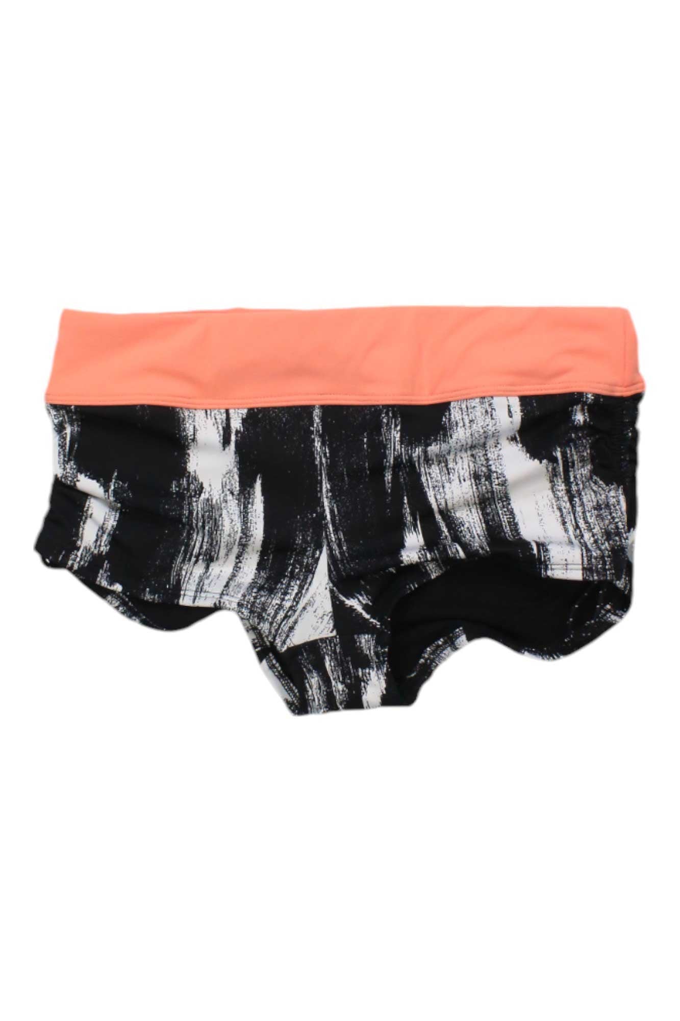 The TYR Womens Dry Brush Della Boyshort features a wide coral pink waistband and a black-and-white abstract brushstroke pattern in a fitted boyshort style, shown against a white background.