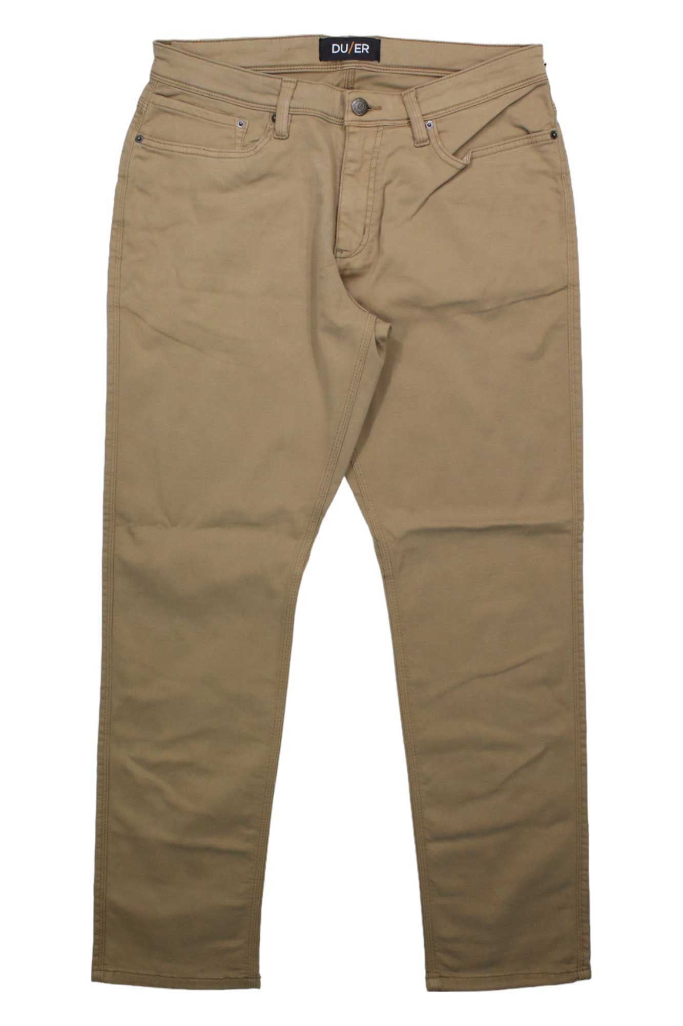 The DU/ER Mens No Sweat Relaxed Fit Pant in tan features a classic five-pocket design, belt loops, moisture wicking fabric, a button waistband, and an inner waistband that displays the DU/ER label.