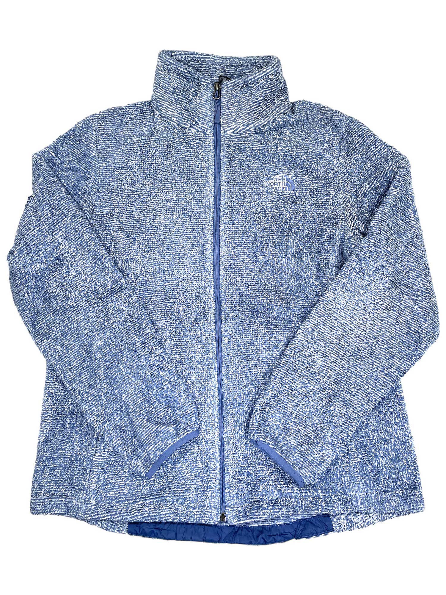 The Women's Osito 2 Jacket, featuring blue and white heathered fleece, a high collar, long sleeves, secure-zip hand pockets, and textured fabric, is displayed laid flat on a white background.