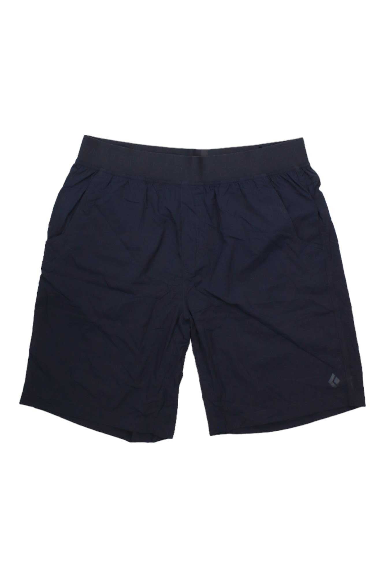 The Black Diamond Mens Sierra LT Short in navy blue features an elastic waistband, two side pockets, and a small logo on the lower left leg. These ultralight men's shorts are displayed laid flat on a white background.