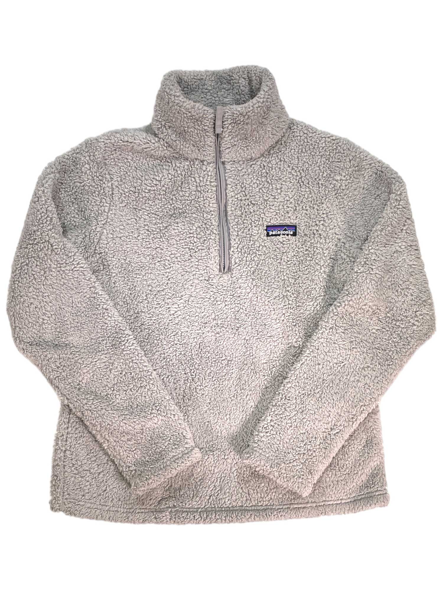 The Womens Los Gatos 1/4-Zip Fleece is a light gray, long-sleeve pullover with a stand-up collar, quarter-zip front, and a small rectangular Patagonia logo patch on the left chest. Made from textured, fluffy recycled polyester fleece.