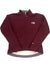 A maroon The North Face Apex Bionic Jacket for men, featuring a front zipper, chest pocket, left-chest logo, slightly longer back hem, and simple cuffs and collar.