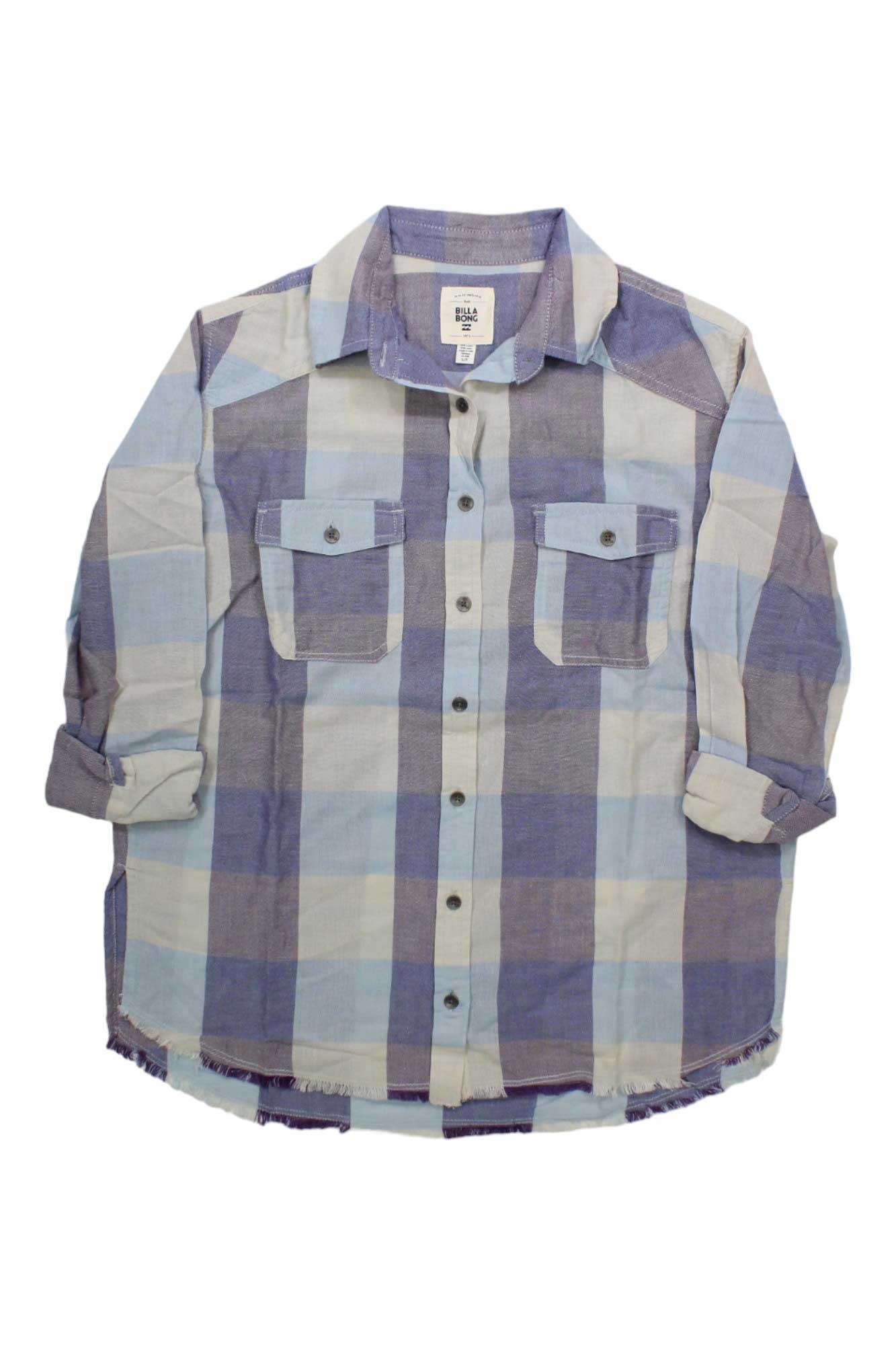 The Billabong Womens Riding Solo Shirt features large blue, gray, and white plaid, two chest flap pockets, rolled-up sleeves, a collar, and a curved hem—an ideal cotton casual shirt for everyday style.
