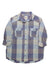 The Billabong Womens Riding Solo Shirt features large blue, gray, and white plaid, two chest flap pockets, rolled-up sleeves, a collar, and a curved hem—an ideal cotton casual shirt for everyday style.