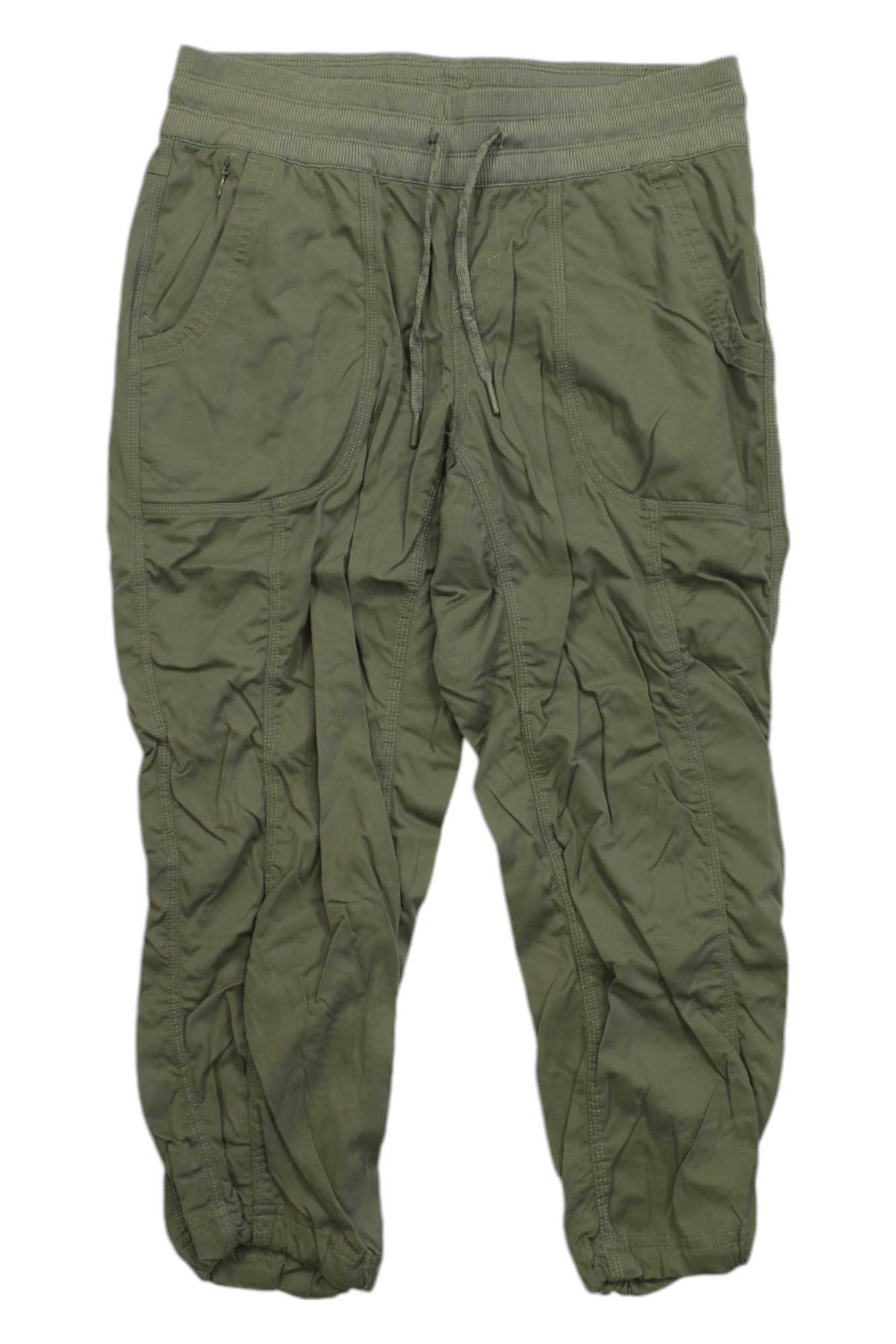 The Womens Aphrodite 2.0 Capris feature an elastic waistband with drawstring, multiple pockets, quick-drying fabric, elastic ankle cuffs, and a lightly crinkled look—ideal for comfortable adventures on the go.