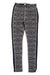 The Kari Traa Womens Floke Pant is a pair of patterned thermal leggings crafted from a soft wool-modal blend, featuring a black and white geometric design, navy side panels, and an elastic waistband with the white Kari Traa logo.
