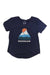 The Moosejaw Womens Iceberg Salad Flowy V-Neck SS Tee is a navy blue organic cotton top with a sun setting behind white mountains, blue stripes, and MOOSEJAW printed below the graphic for all-day comfort.