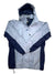 A Soft Shell Snow Skirt Jacket in light gray and navy blue is laid flat with crossed sleeves, featuring a front zipper, snap buttons, pockets, and the Helly Hansen logo on the chest.