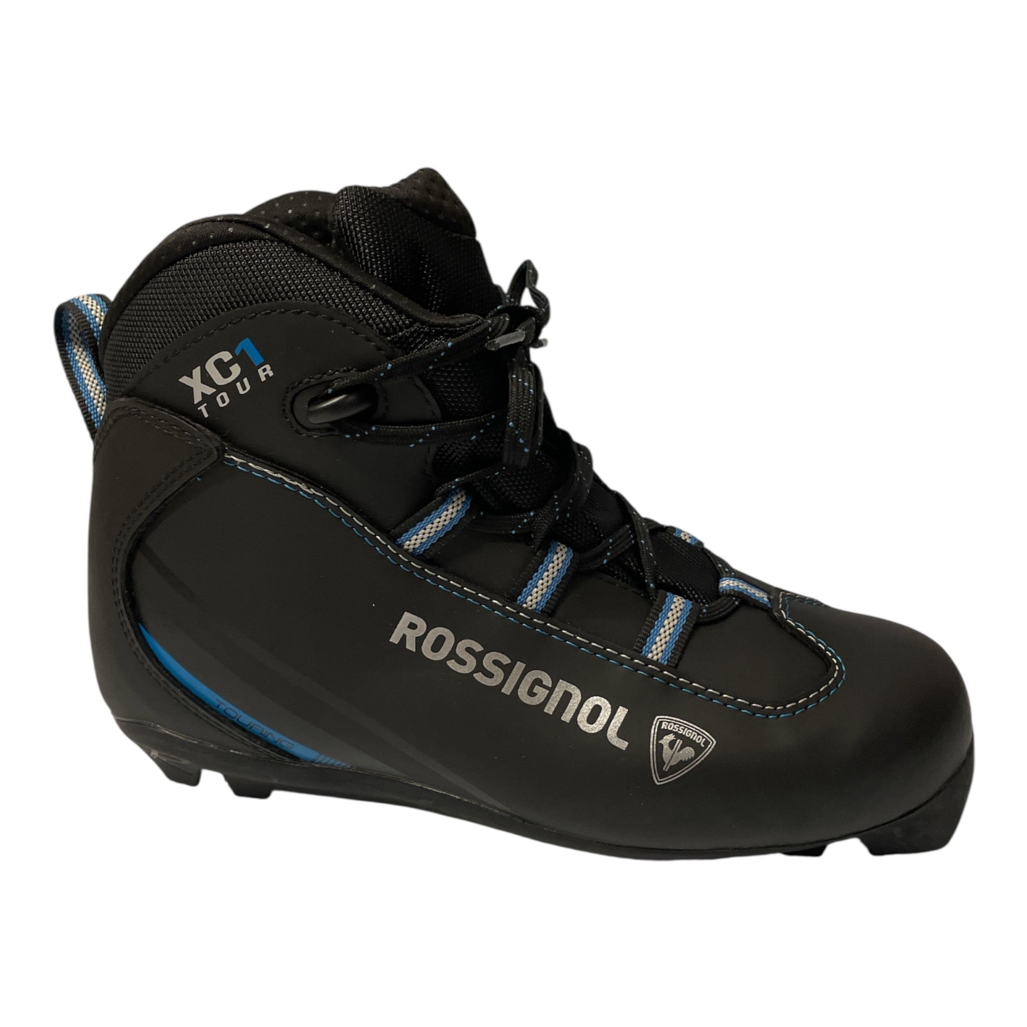 The Rossignol Women Touring Nordic Boots X-1 Fw, shown in black with blue accents and side brand logos, feature a lace-up closure. Presented from a side view on a white background. Ideal for cross-country skiing adventures.