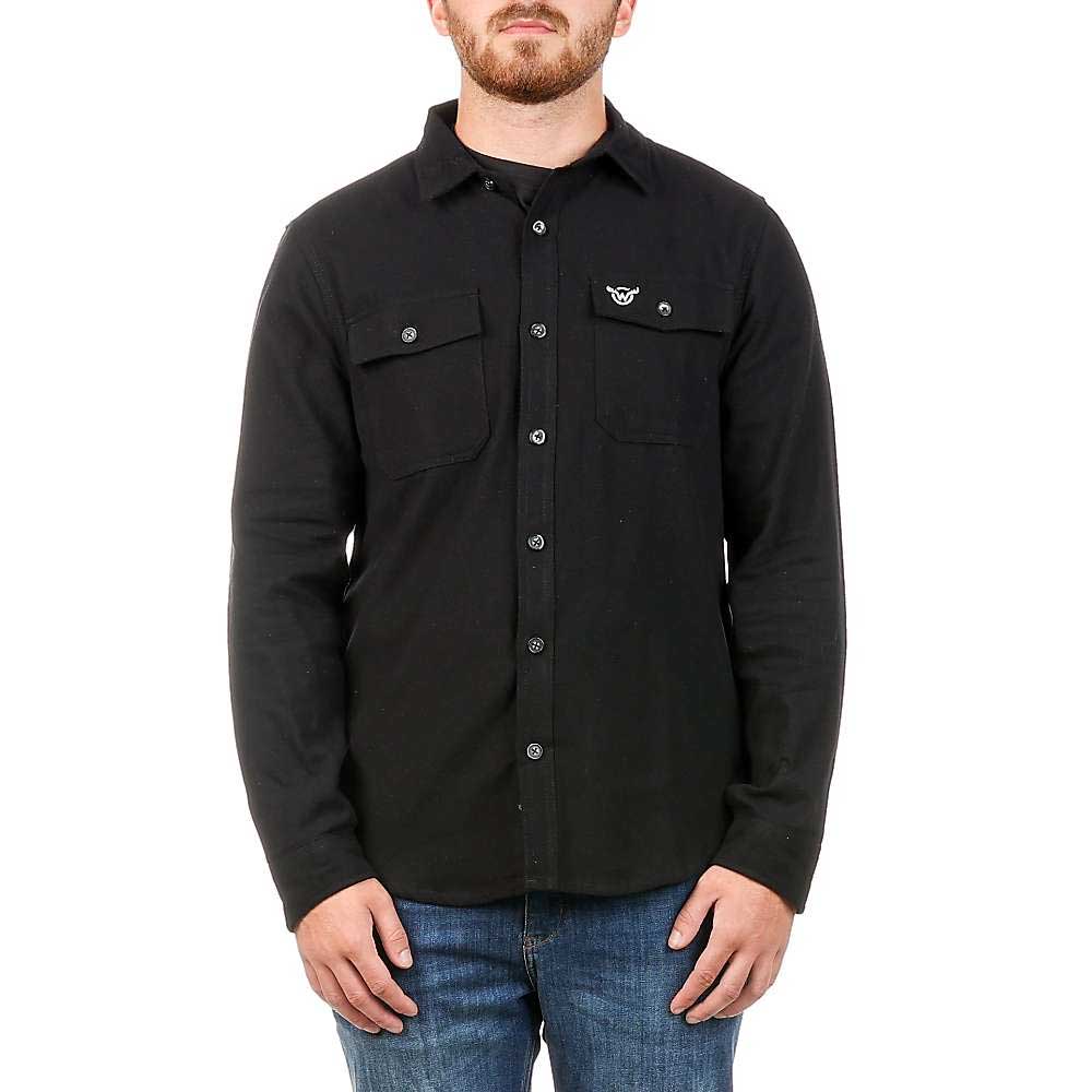 A man in a Moosejaw Mens Old Fashioned Flannel with two front pockets and blue jeans stands facing forward against a plain white background, ready for outdoor adventures.