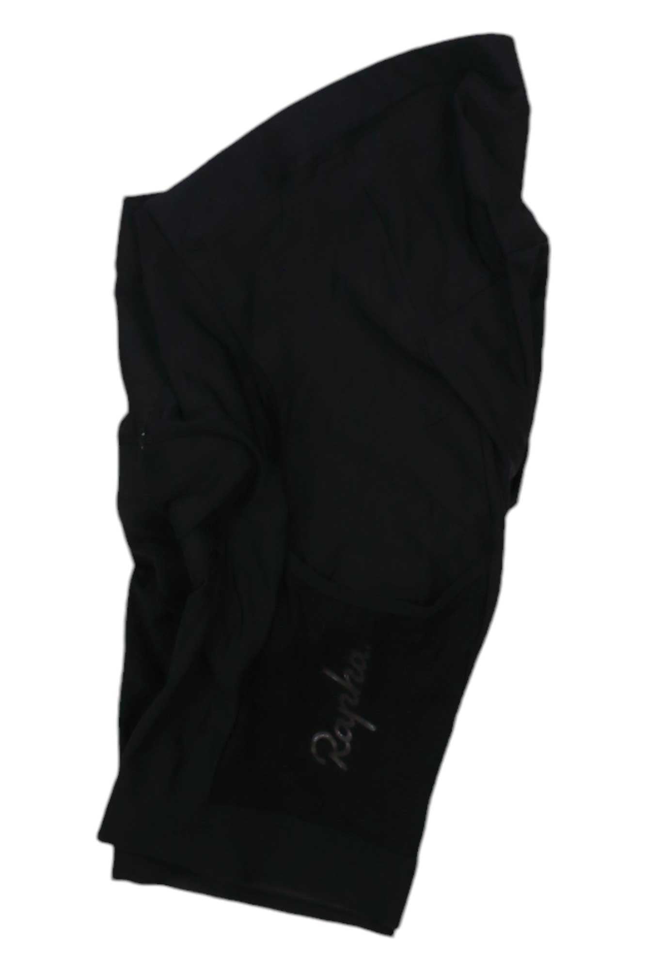 Rapha black cargo shorts, rear view with flap cargo pockets and logo