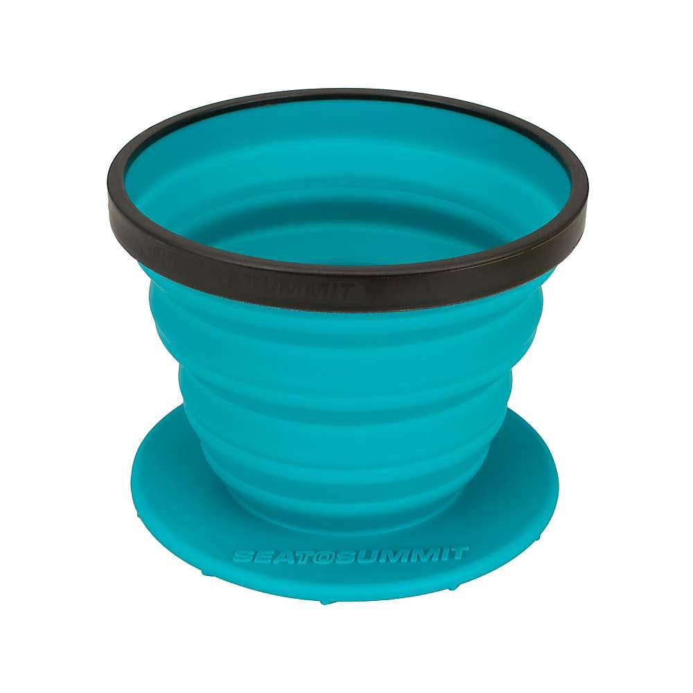 Coffee dripper cup with teal silicone body, black rim, and stacked ridges