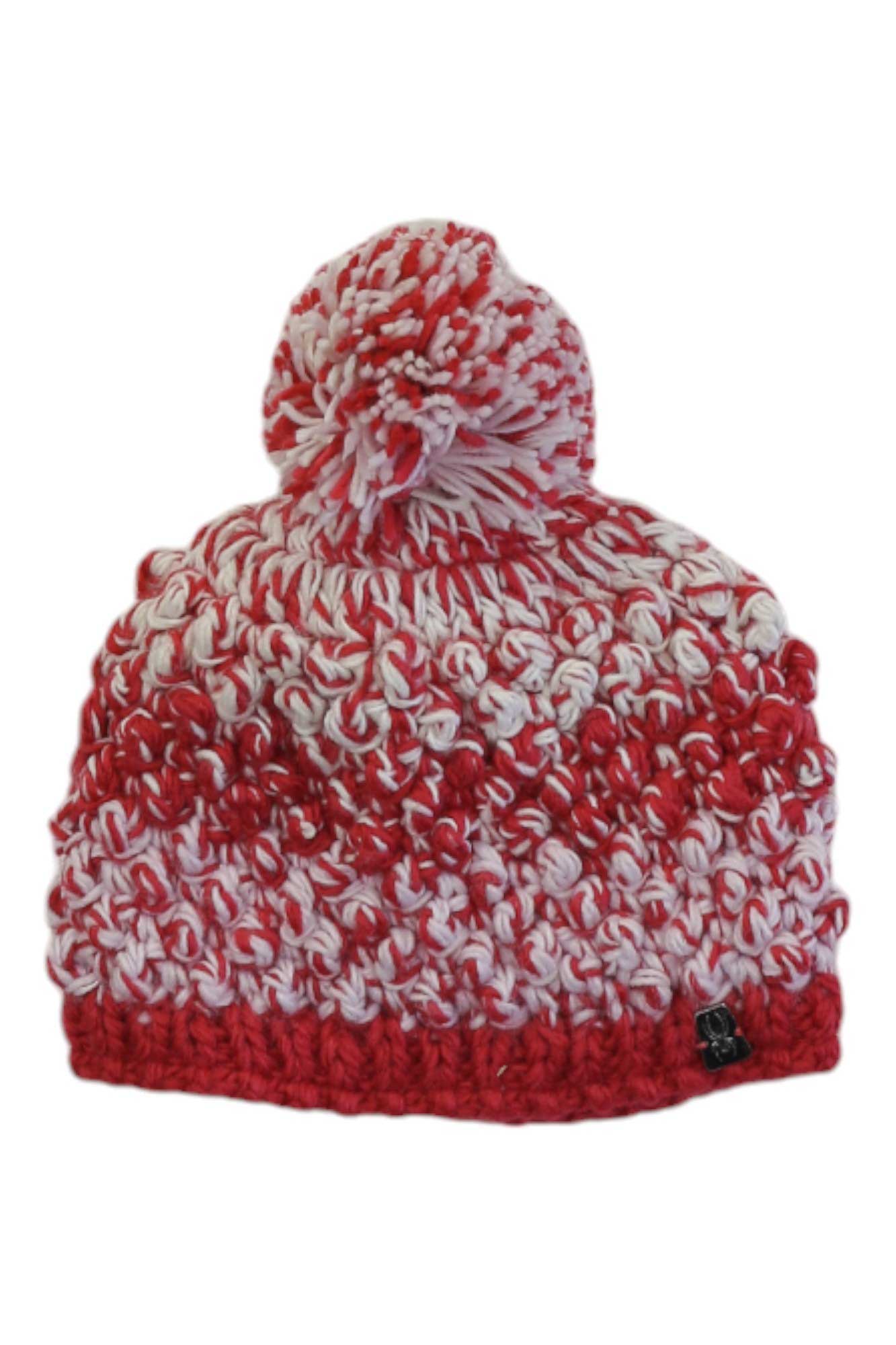 The Spyder Girls Bitsy Brrr Berry Hat is a red and white winter hat with a chunky knit, large pom-pom, and cozy fleece lining for extra warmth.