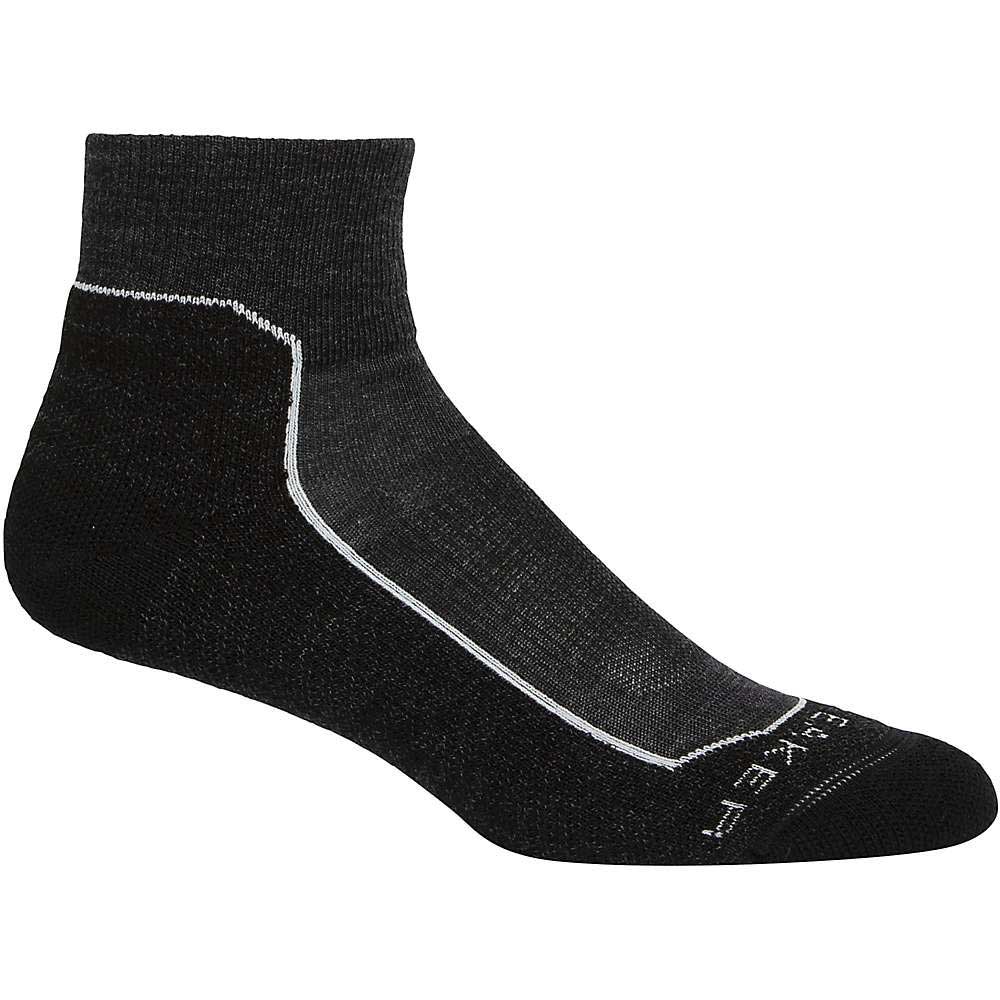 A single black Icebreaker Women's Hike+ Light Mini Sock, featuring white side stitching and "REI" in white on the toe, is displayed against a plain white background.