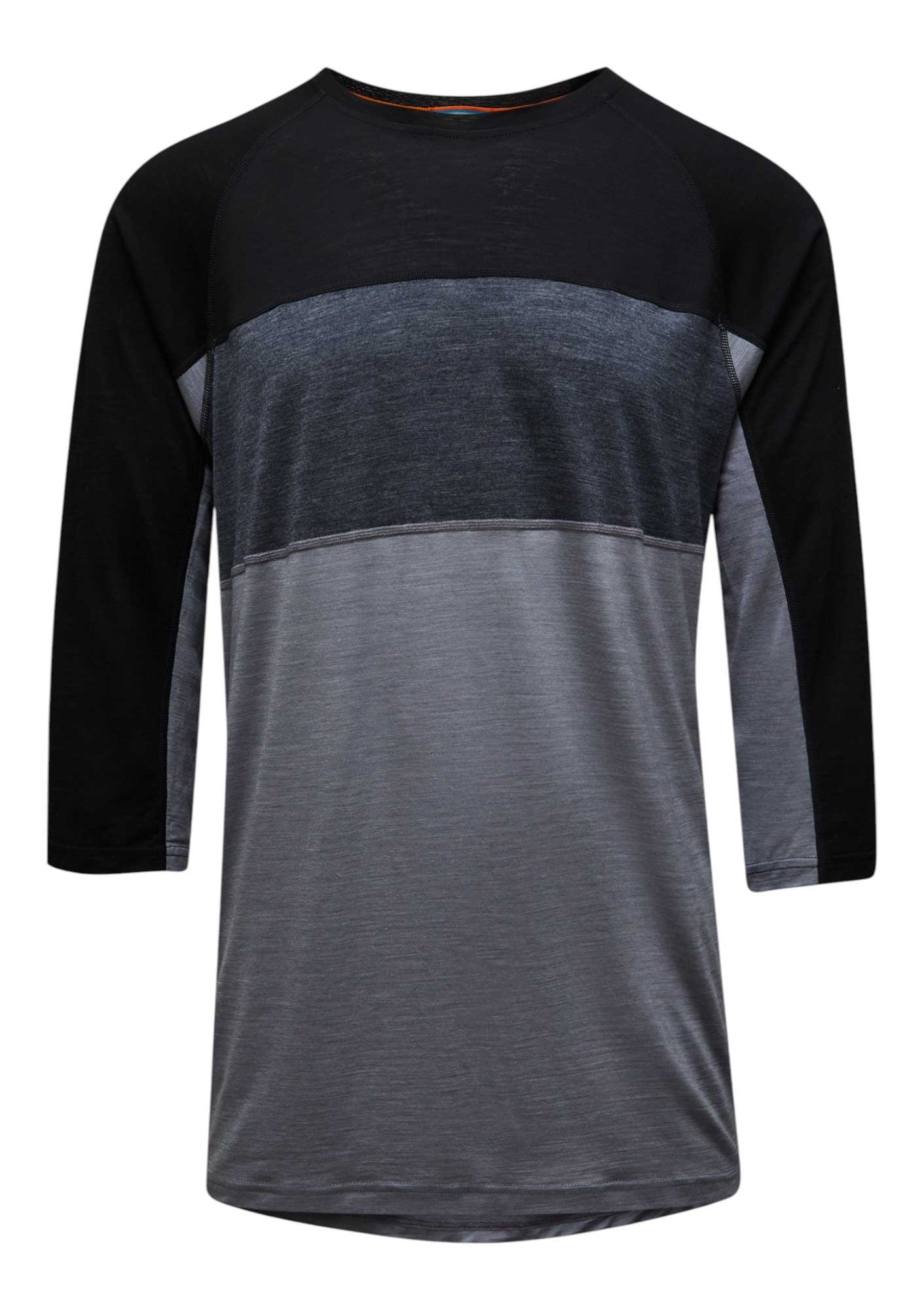 The Smartwool Men's Merino Sport 120 Mountain Biking 3/4 Sleeve Tee features black raglan sleeves and a three-tone gray body, offering comfort and style for mountain biking or everyday wear.