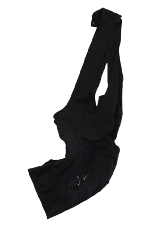 A black, asymmetrical shoulder bag with a long strap and soft fabric, ideal for carrying your Mens Bib Shorts or other cycling gear, displayed on a white background.