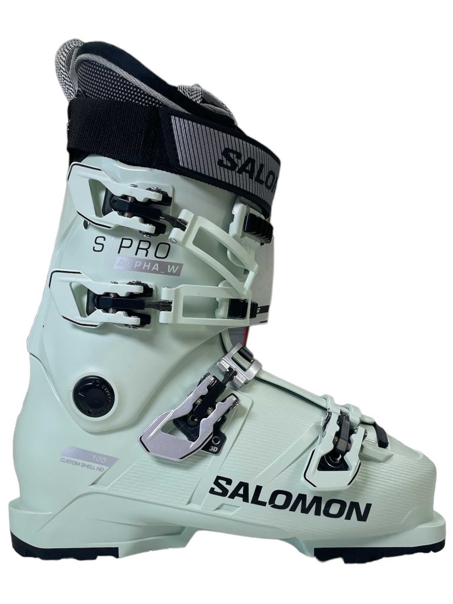 Women’s ski boot, light moss green shell with adjustable buckles and padding