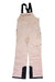 The Outdoor Research Womens Carbide Bib is light pink insulated snowsports apparel with a waterproof bib design, black adjustable shoulder straps, zippered pockets, and reinforced black inner ankles for extra durability.