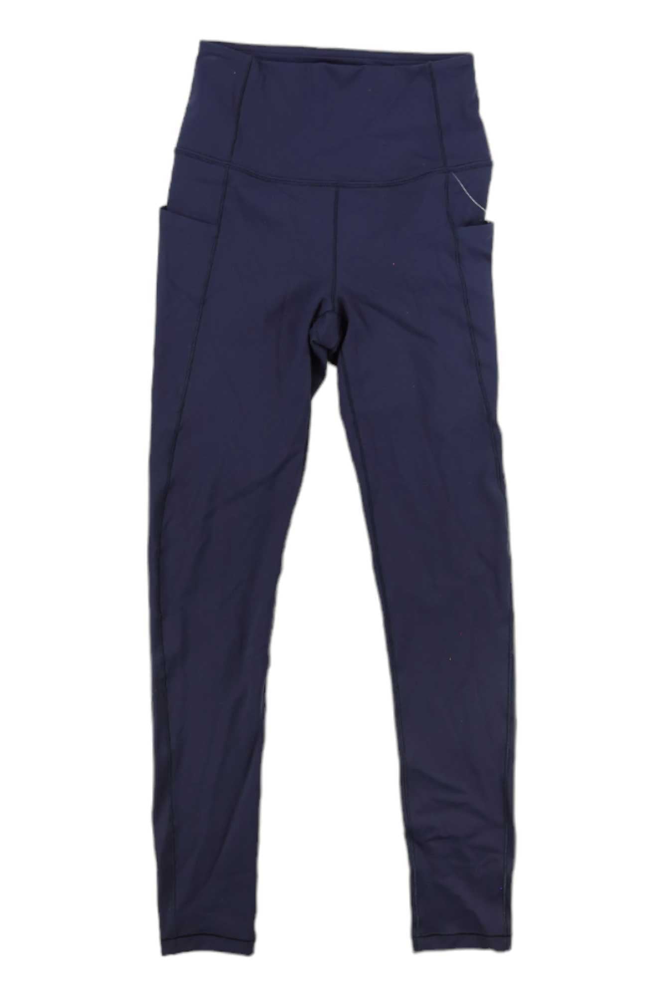 The Arcteryx Womens Essent High-Rise 26 Inch Legging in dark blue features a high waist, stretch fabric, and side pockets—ideal for workouts or as durable hiking leggings. Shown here laid flat on a white background.