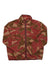 The Sherpa Womens Uddesya Eco Jacket is a zip-up fleece with a high collar, crafted from recycled polyester in brown, tan, and red camo. The women’s travel jacket is shown laid flat with sleeves crossed at the bottom.