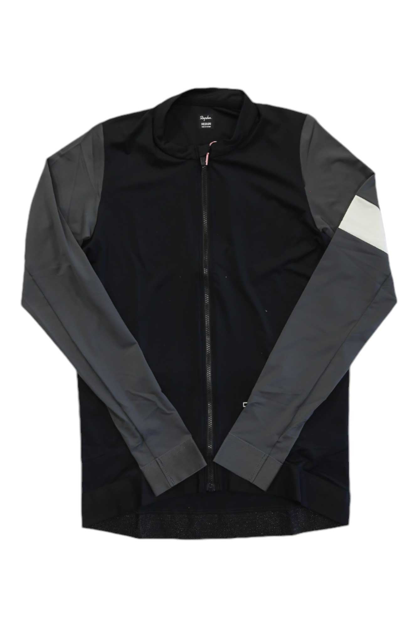 The Rapha Mens Pro Team Long Sleeve Training Jersey features a black body, dark grey sleeves, a white stripe on the left upper arm, and a full front zipper—premium cycling apparel for dedicated riders.