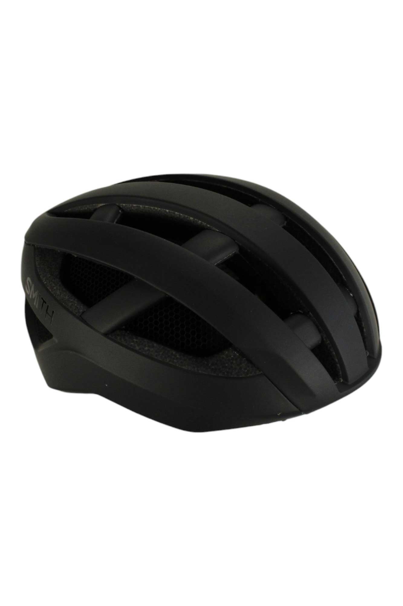 The Smith Network MIPS Helmet in matte black features a sleek, aerodynamic design with multiple large vents for enhanced comfort and superior cycling safety.