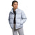 A young woman stands with her hands in her pockets, wearing The North Face Kids 1996 Retro Nuptse Jacket in light gray and gray sweatpants. This insulated jacket features the chest logo and is ideal for outdoor adventures.
