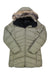 The Marmot Womens Montreal Down Coat in light olive green features a chevron-quilted design, zipper front, hood with faux fur trim, long sleeves, and water-resistant down for warmth and comfort.